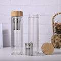 Bouteille d&#39;eau en verre borosilicaté et en bambou la plus vendue avec infuseur de fruits